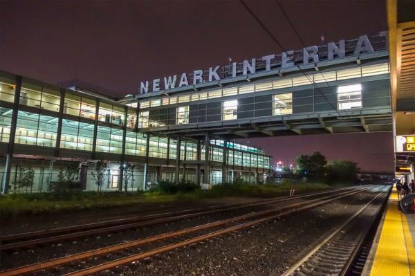 Newark Airport is relying on plastic or glass partitions to stop people from skipping security checkpoints.