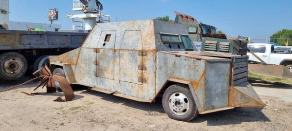 A pick up truck, retrofitted with me<em></em>tal sheets by cartels, turning a regular vehicle into an armored tank.