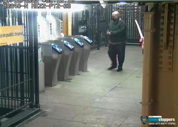 FILE ? This image provided by New York Police Department, April 13, 2022, shows subway shooter Frank James, 62, leaving a subway station after his attack on a subway train, April 12, 2022. James, who sprayed a New York City subway car with bullets during rush hour, wounding 10 people and sparking a citywide manhunt, was sentenced, Thursday, Oct. 5, 2023, to life in prison after defense attorneys underscored his serious mental illness and said he didn't ever intend to kill anyone. (New York Police Department via AP, File)