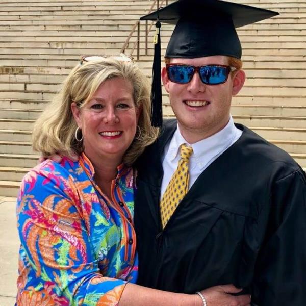 Maggie Murdaugh and her oldest son, Buster, in an undated graduation photo.