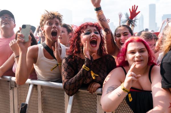 Chappell Roan fans cheer as she performs o<em></em>nstage during Lollapalooza at Grant Park on August 01, 2024 in Chicago, Illinois. 