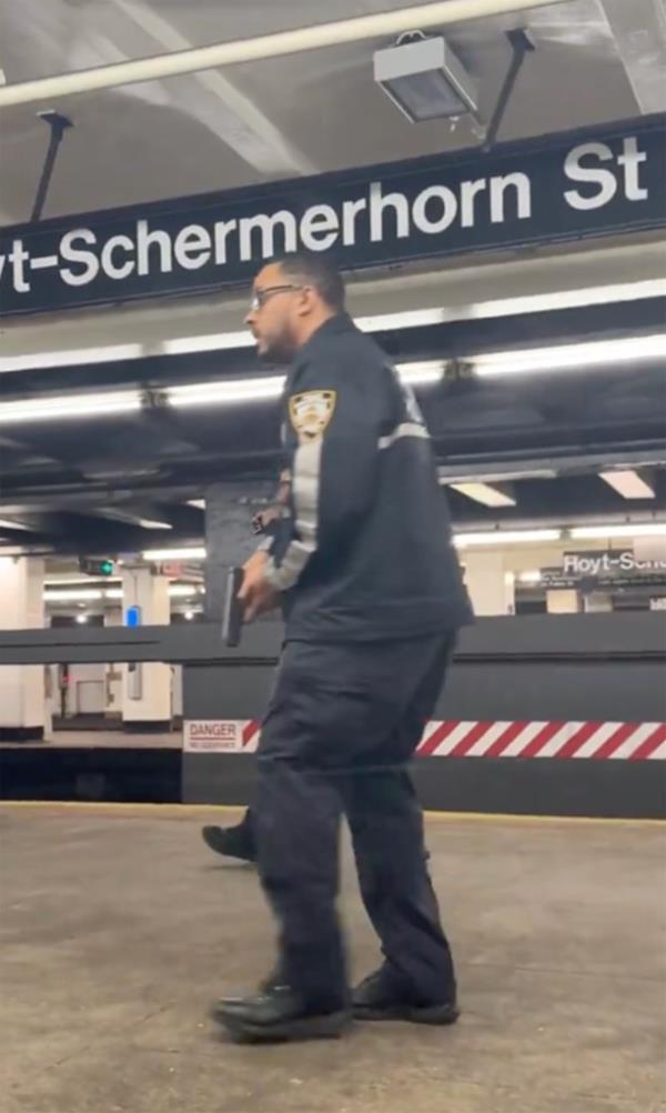 A police officer is seen at Hoyt-Schermerhorn Street station following the fight.