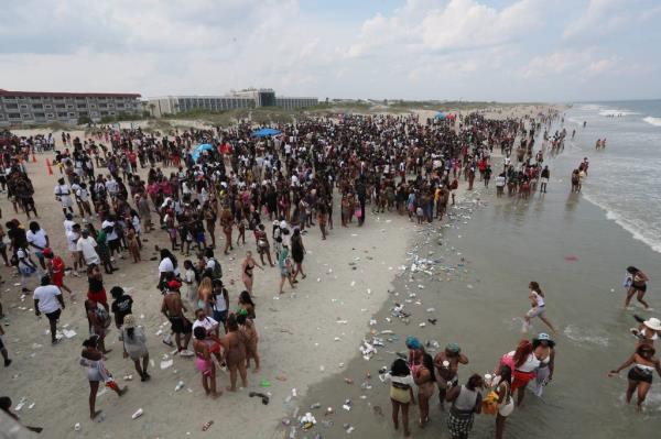 Tybee Island officials say there was enough trash left on the beach Saturday to fill more than 10 all-terrain vehicle carts.
