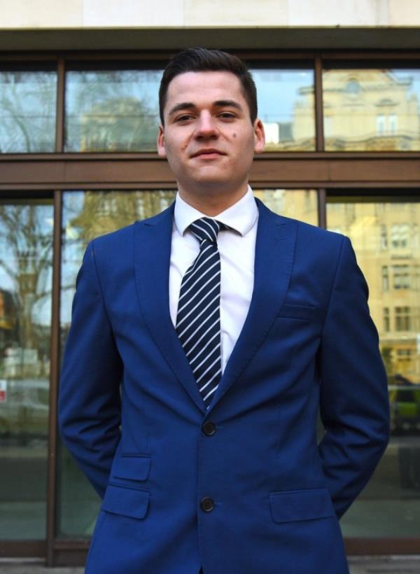 Sam Newey, pictured outside Westminster Magistrates' Court, London, in February 2020 wher<em></em>e he and his father appeared on charges under the Terrorist Act for sending mo<em></em>ney to his brother in Syria (Picture: PA)