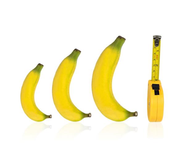 Bananas and measuring tape isolated