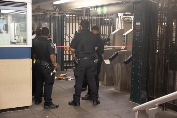 Police are seen at the 138 St. and Grand Co<em></em>ncourse subway station in The Bronx, Tuesday, Sept. 24, 2024, wher<em></em>e a man was stabbed. 