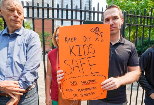Protest amo<em></em>ngst community members located on W 59 Street alo<em></em>ngside the Gertrude Ederle Playground and Recreation Center, which extends through to 232 W 60st.