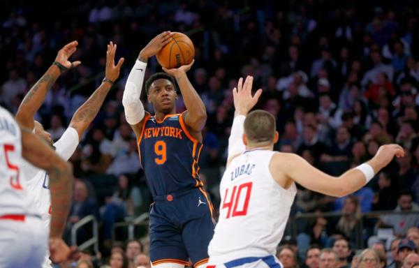 New York Knicks guard RJ Barrett (9) shoots over Los Angeles Clippers center Ivica Zubac 