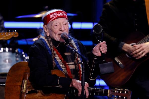 Willie Nelson smiling. 