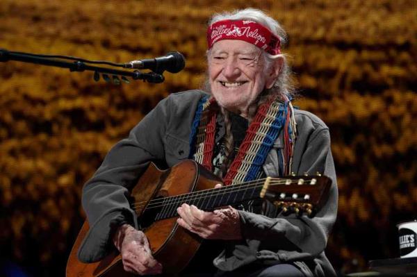 Willie Nelson smiling. 