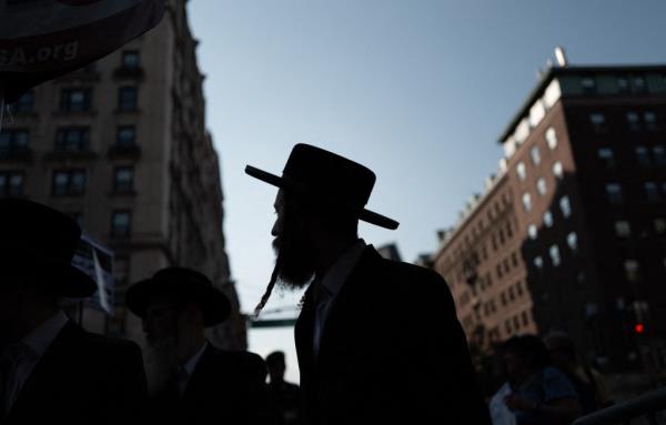 Members of the Haredi Jewish group Neturei Karta counter-protesting at a demo<em></em>nstration outside Columbia University, New York