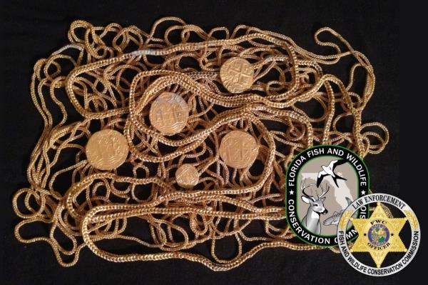 A gold chain with centuries-old recovered gold coins dating back to the 1715 Treasure Fleet.