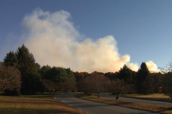 Smoke billowing out from a forest fire in Connecticut