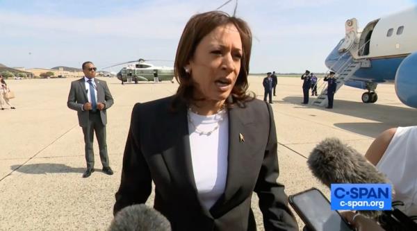 Kamala Harris speaking to reporters.