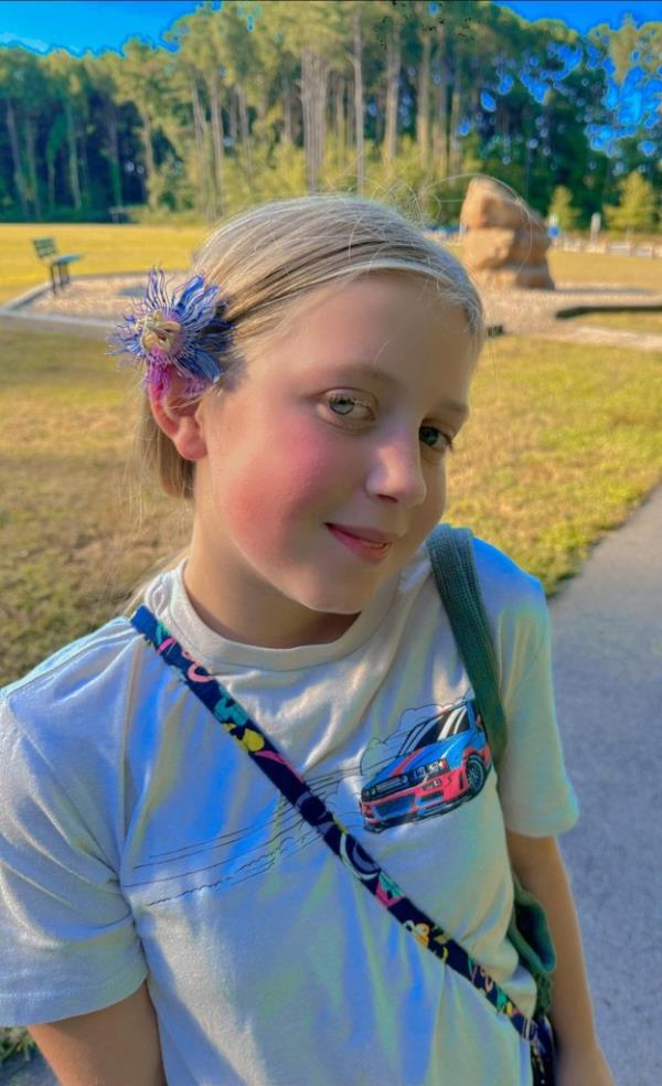 Vada Carawan poses with a flower in her hair