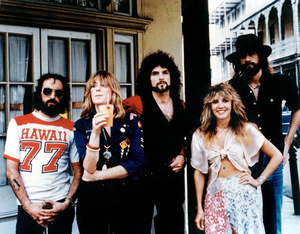 John McVie, Christine McVie, Lindsey Buckingham, Stevie Nicks and Mick Fleetwood posing outside in the 1970s