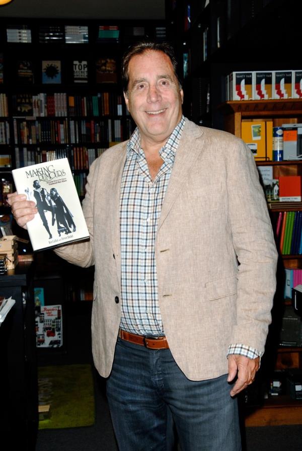 Ken Caillat holding Making Rumours