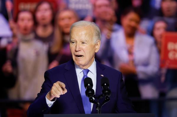 Joe Biden speaks at a Reproductive Freedom Campaign Rally in Manassas, Virginia, advocating for reproductive rights.