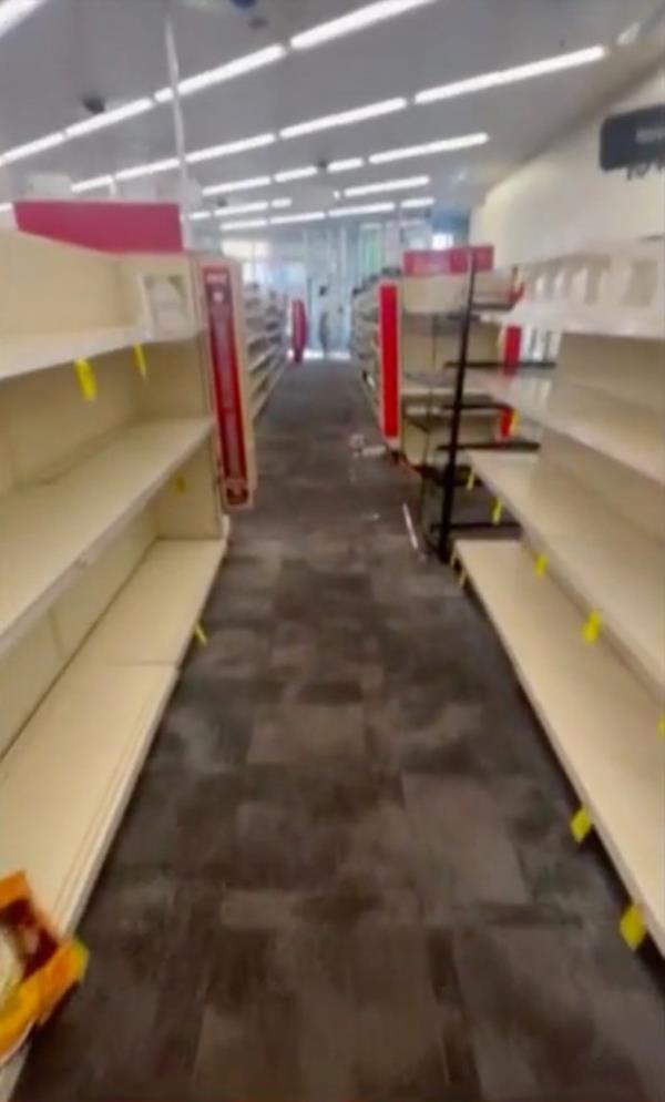 Rows of empty shelves at CVS thanks to shoplifters.