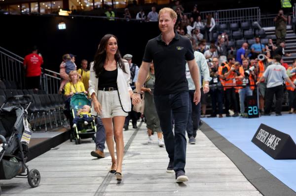 Prince Harry, Duke of Sussex and Meghan, Duchess of Sussex attend the Wheelchair Basketball preliminary match between Ukraine and Australia during day four of the Invictus Games Düsseldorf 2023 on September 13, 2023 in Duesseldorf, Germany.