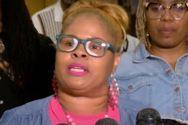 Tamika Johnson speaks for a group working to recall four members of the Milwaukee Public School Board for misleading voters and failing to tell parents a<em></em>bout financial problems in the district.