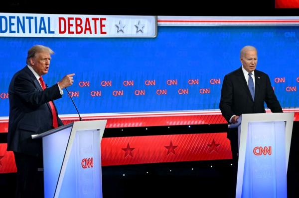 US President Joe Biden and former US President and Republican presidential candidate Do<em></em>nald Trump participate in the first presidential debate of the 2024 elections at CNN's studios in Atlanta, Georgia, on June 27, 2024. 