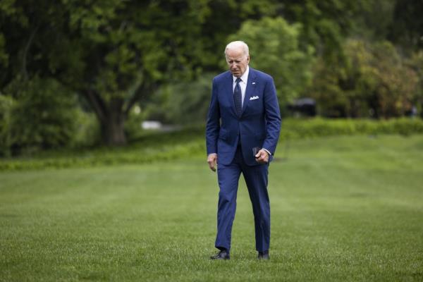 US President Joe Biden walks on the South Lawn of the White House.