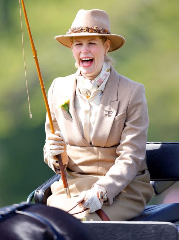 Lady Louise Windsor laughing while participating in the Pol Roger Meet of The British Driving Society at 2023 Royal Windsor Horse Show.
