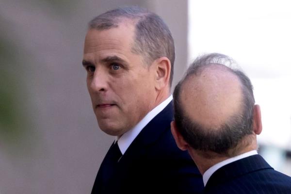 Hunter Biden (L), son of US President Joe Biden, walks with his attorney Abbe Lowell (R) after arriving to be arraigned at the US Federal District Court in Wilmington, Delaware, USA, 03 October 2023.
