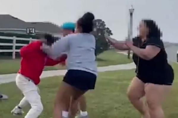 The fight broke out while students were waiting at a local bus stop last Friday.