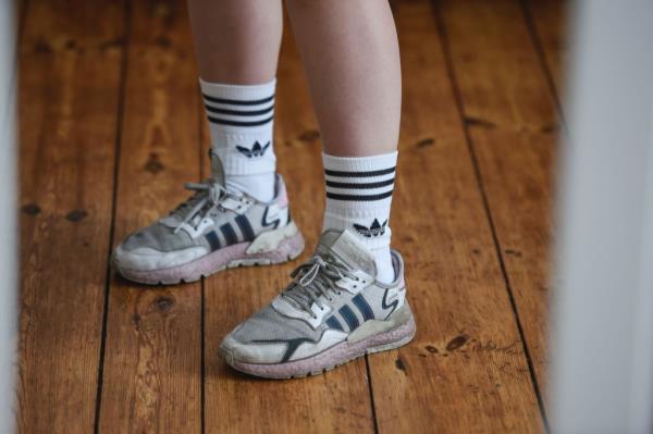 worn in adidas sneakers