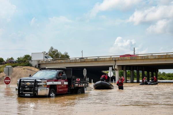 Channelview Fire Department and sheriffs preparing for evacuation due to severe flooding in Channelview, Texas on May 4, 2024 featuring Andreas Hestler.