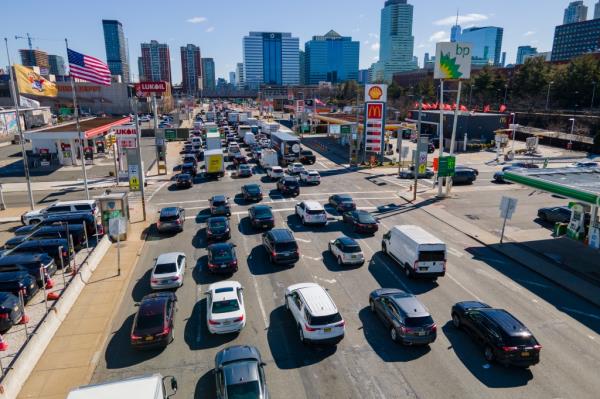 People wait to drive through the heavily co<em></em>ngested Holland Tunnel into New York City during morning rush hour traffic in Jersey City, New Jersey.