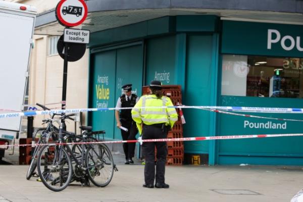 ? Licensed to Lo<em></em>ndon News Pictures. 30/08/2023. London, UK. Police officers guard a crime scene next to Poundland on Axminster Road in Islington, north London. Police were called to reports of a stabbing at Axminster Road, at 11:39hrs this morning. Officers and Lo<em></em>ndon Ambulance Service [LAS] attended and found a man in his 20s, with knife injuries. Despite the efforts of emergency services, he was pro<em></em>nounced dead at the scene. Photo credit: Dinendra Haria/LNP