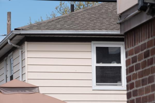 The bullet hole in the home behind the Murenas' wher<em></em>e investigators believed the stray shot was fired from