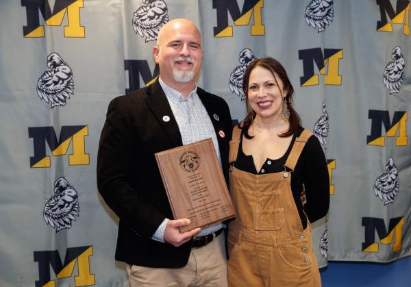 Teacher Joseph Nappi with students in classroom.