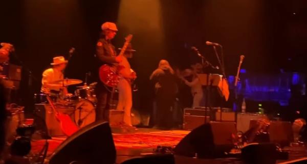 Fro<em></em>ntman Anton Newsome is seen taking his guitar and swinging it at Guitarist Van Kriedt.
