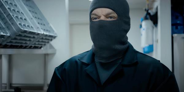 Matt Damon wearing a balaclava in The Instigators