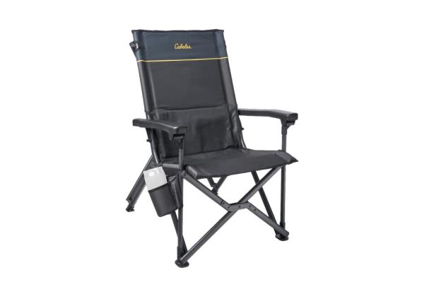 A black folding chair with a white cup holder