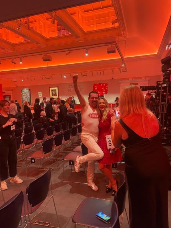 Die-hard fan Philip Copping posed with fans at Sotheby's (Picture: Liam Coleman)