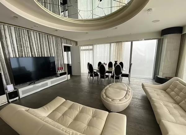 People walks through the halls of Syrian President Bashar Assad's presidential palace.