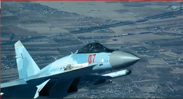 A Russian fighter flies dangerously close to a U.S. MQ-9.