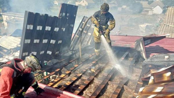 pictured are fires being put out after Sunday bombings 