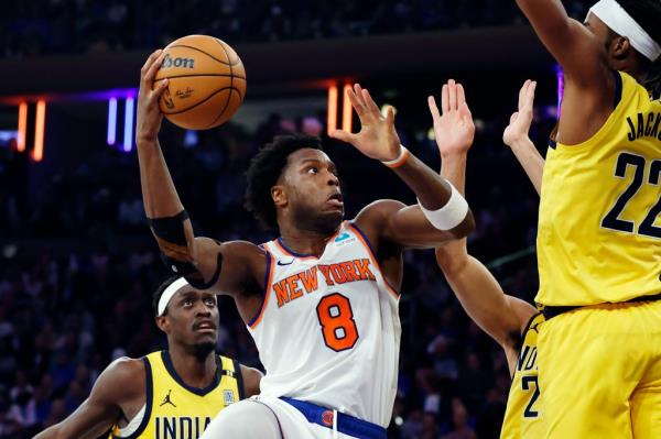 OG Anunoby #8 of the New York Knicks goes to the basket as Pascal Siakam #43 and Isaiah Jackson #22 of the Indiana Pacers defend during Game One of the Eastern Co<em></em>nference Second Round Playoffs at Madison Square Garden on May 06, 2024 in New York City. 