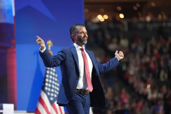 Do<em></em>nald Trump Jr. walks on stage to speak on the third day of the Republican Natio<em></em>nal Co<em></em>nvention at Fiserv Forum.