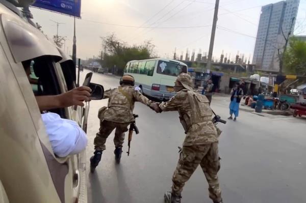 The alleged Taliban skaters in the video were carrying AR-47 rifles.