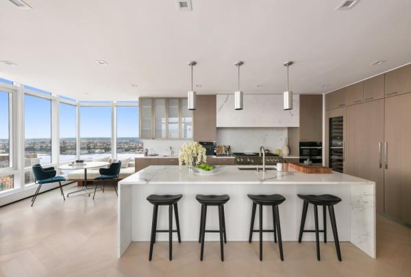 The open eat-in chef's kitchen comes with stunning views