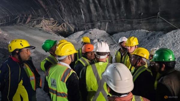 Heavy machinery brought in to pull out workers from collapsed tunnel in India