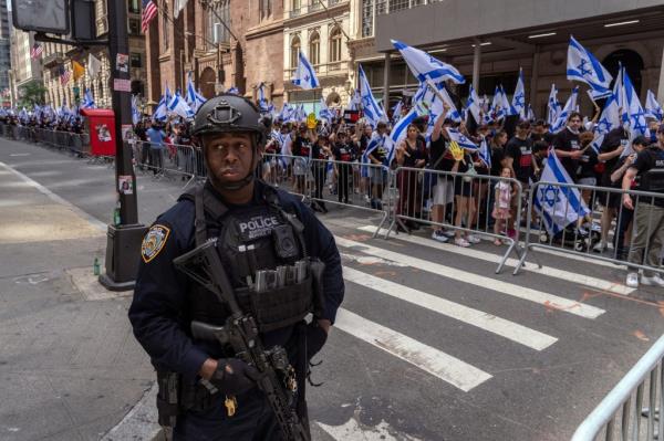 NYPD Emergency Service Unit patrolling with rifles at the Israel Day parade on Fifth Avenue, New York City, June 2, 2024