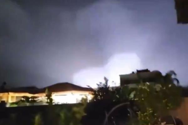 Israel co<em></em>nducting airstrikes in Iran, Syria and Iraq as seen by a light shining through the sky